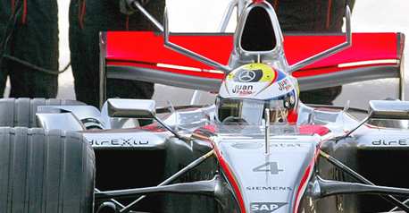 McLaren boss cautious