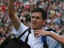Henman to defend title