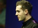 Selby crashes out as Trump survives scare in Newport