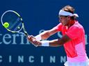 Nadal eases to third round