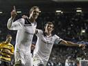 Spurs ease through