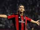 Milan held to Genoa draw