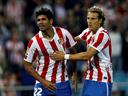 10-man Atletico win