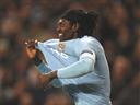 Adebayor fires treble 