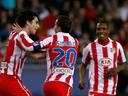 Simao inspires Atletico