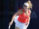 Wozniacki cruises to glory