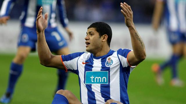 Porto advance despite defeat