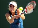 Wozniacki through in Miami