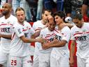 Sevilla win, Malaga lose