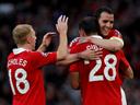United cruise into final