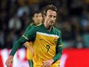 Aussies win, Japan held