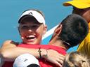 Wozniacki, Djokovic top