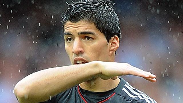 Suarez sublime as Liverpool progress