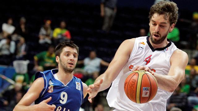 Spain crush Serbs to qualify
