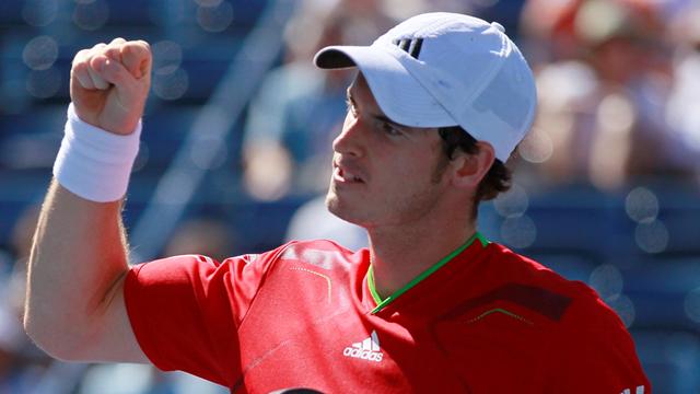 Murray through to semis after Isner battle