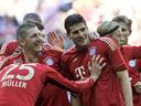 Dazzling Bayern win again