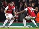 Arsenal top group with win