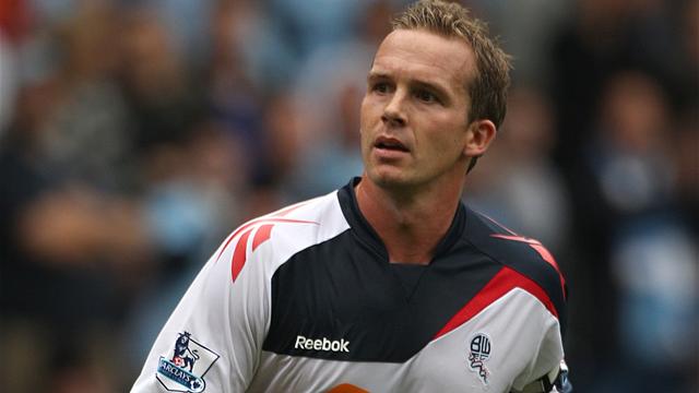 Bolton release 12, Davies stays
