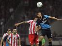 Olympiacos beat Arsenal