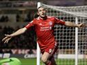 Carroll boosts Liverpool