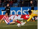 Atletico hold Valencia
