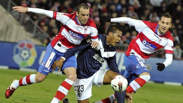 Granada add to Malaga's woes