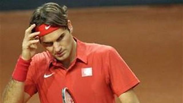 Woe for Federer as Switzerland crash