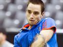 Troicki safely through