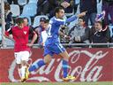 Malaga up to fourth