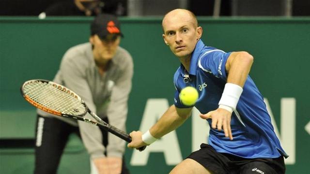 Davydenko sets up clash with Nadal