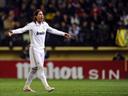 Nine-man Madrid stumble