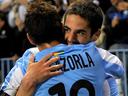 Malaga take third place 