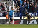 Bolton blow lead to draw