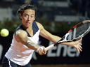 Schiavone wins through