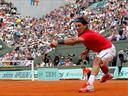 Men: Nadal powers on