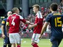 Danes down Aussies