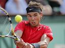 Nadal rolls past Schwank