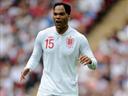 Lescott called up after Lennon, Dawson withdraw
