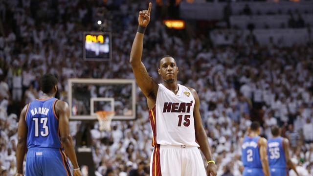 Heat win to edge closer to title