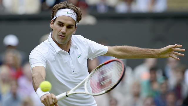 Federer races past Youzhny into semis