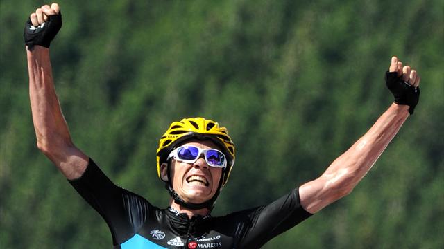 Froome wins as Wiggins takes yellow