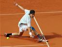 Haas stuns Simon