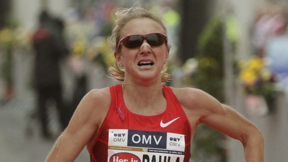 Paula Radcliffe of the UK reacts after running the half marathon race during the Vienna City Marathon in Vienna April 15, 2012.