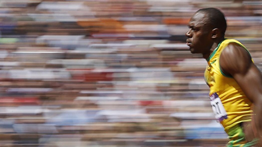 Usain Bolt of Jamaica runs on his way to winning his 100m heat round 1 during the London 2012 Olympic Games (Reuters)