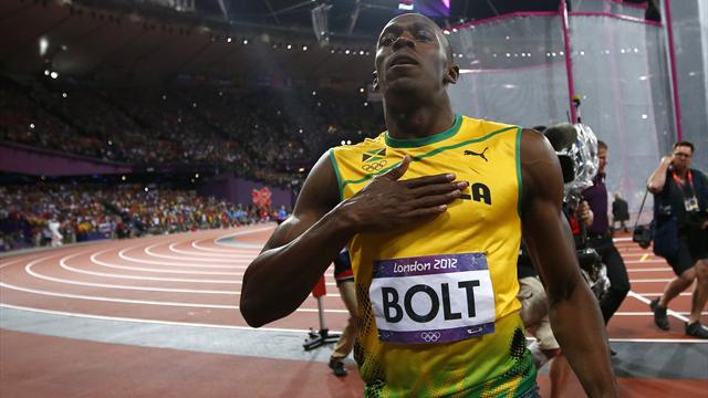 Bolt retains 100m title in Olympic record time
