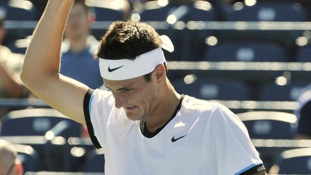 Tomic snaps skid, sets up Toronto tilt with Djokovic
