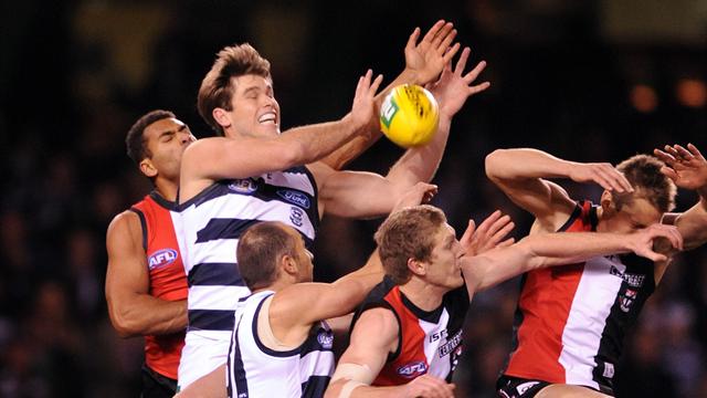 Hawkins fires Cats to win over Saints