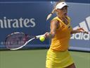 Wozniacki eases through