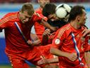 Russia ease to win
