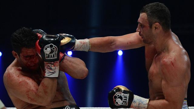 Klitschko defends belt as Charr suffers cut